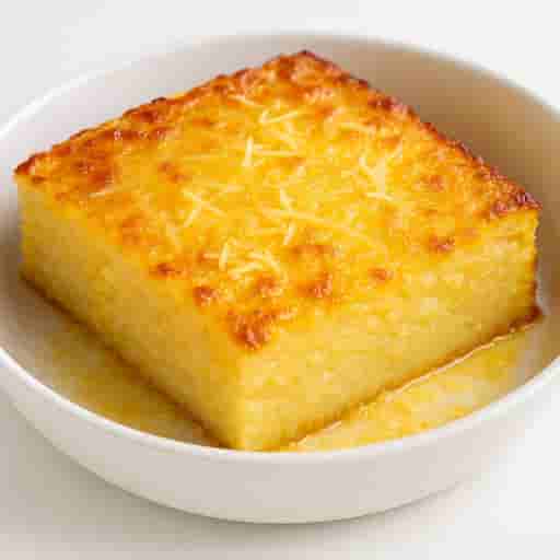 Image of Creamy Filipino Cassava Cake with Cheesy Topping