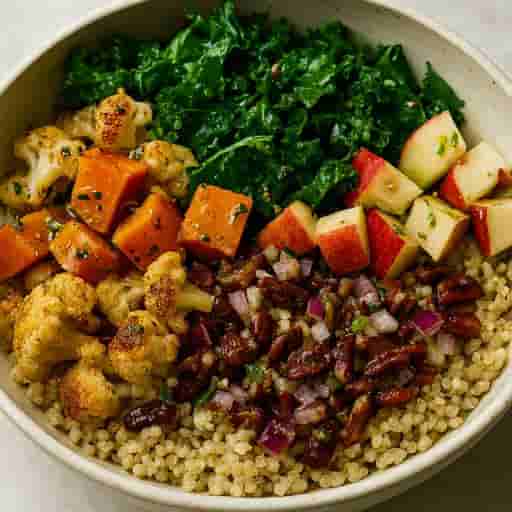 Warm Kale, Sweet Potato & Cauliflower Salad with Lemon-Rosemary Dressing