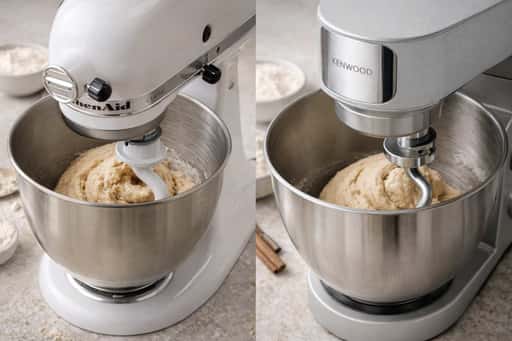 Stand mixer kneading bread dough on a floured counter