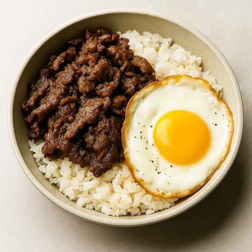 Filipino Tapsilog—Sweet-Savory Beef, Garlic Rice & Eggs! image